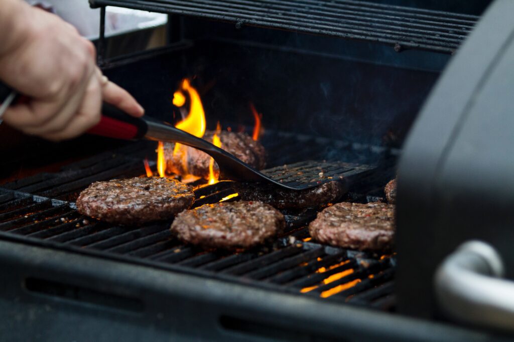 BBQ tip to prevent burgers from sticking to grill.