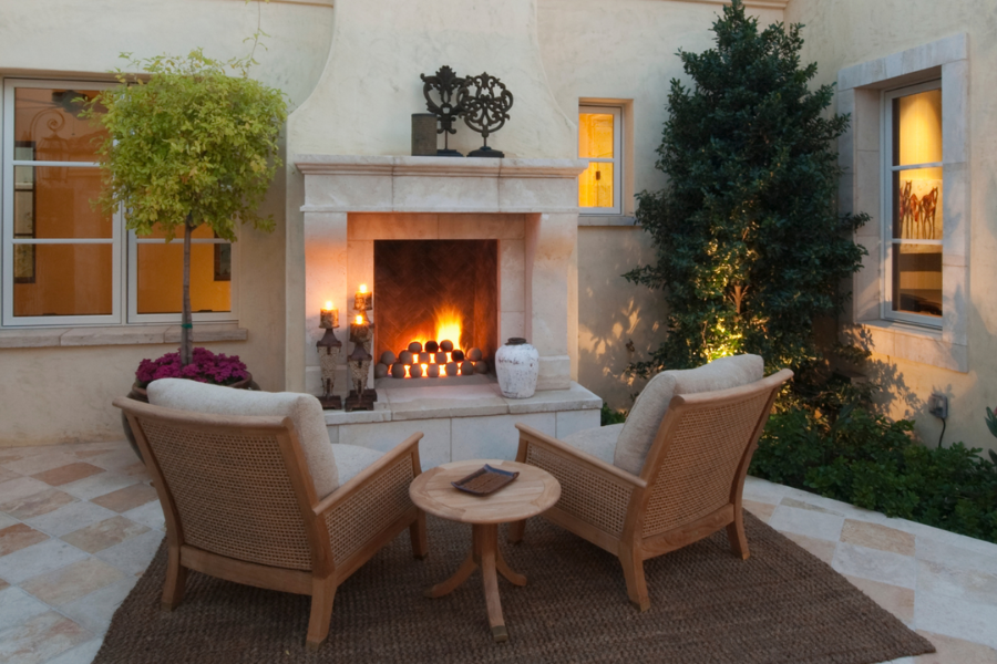 Fireplace added for warming outdoor space.