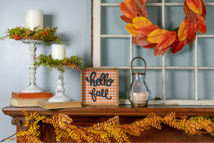 Fall mantel decor in a home.