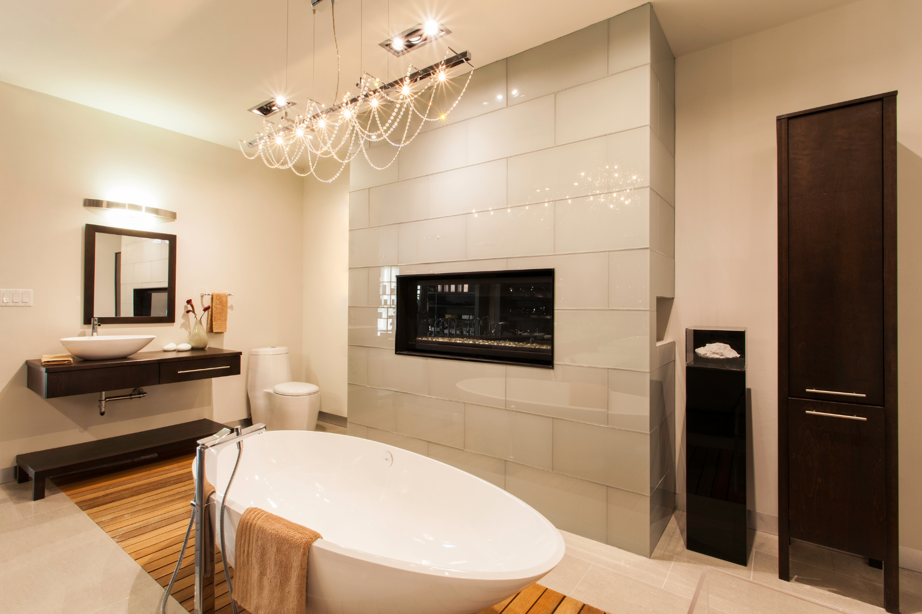 Bathroom with soaker tub and fireplace