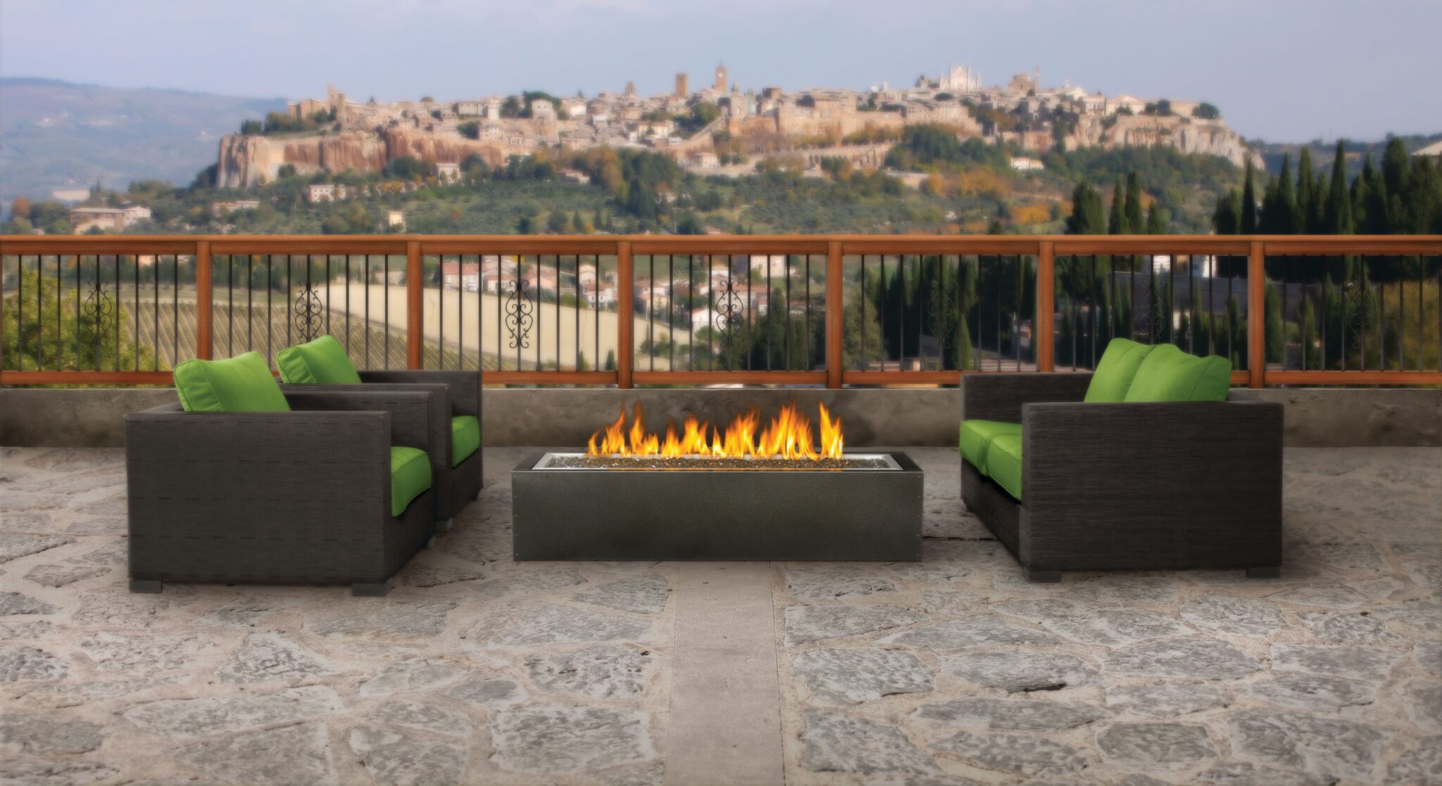 Sleek, minimalist patio furniture with a fire table is one of our top 5 patio decor trends.