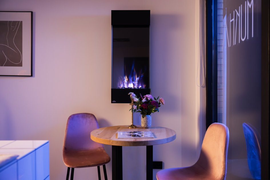 Vertical fireplace design can add a bold element to your room