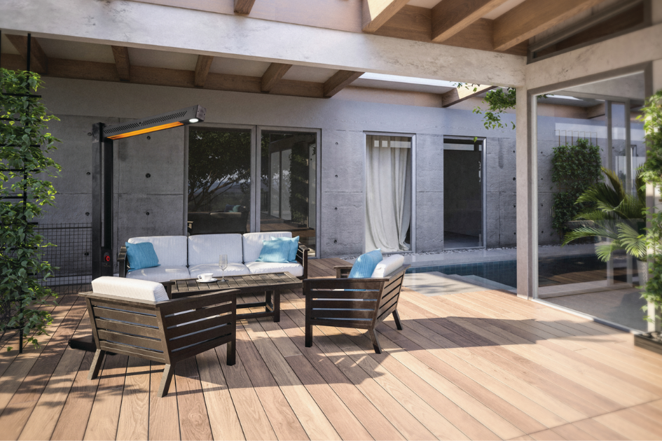 An electric heater warms an outdoor patio set on an overcast day. 