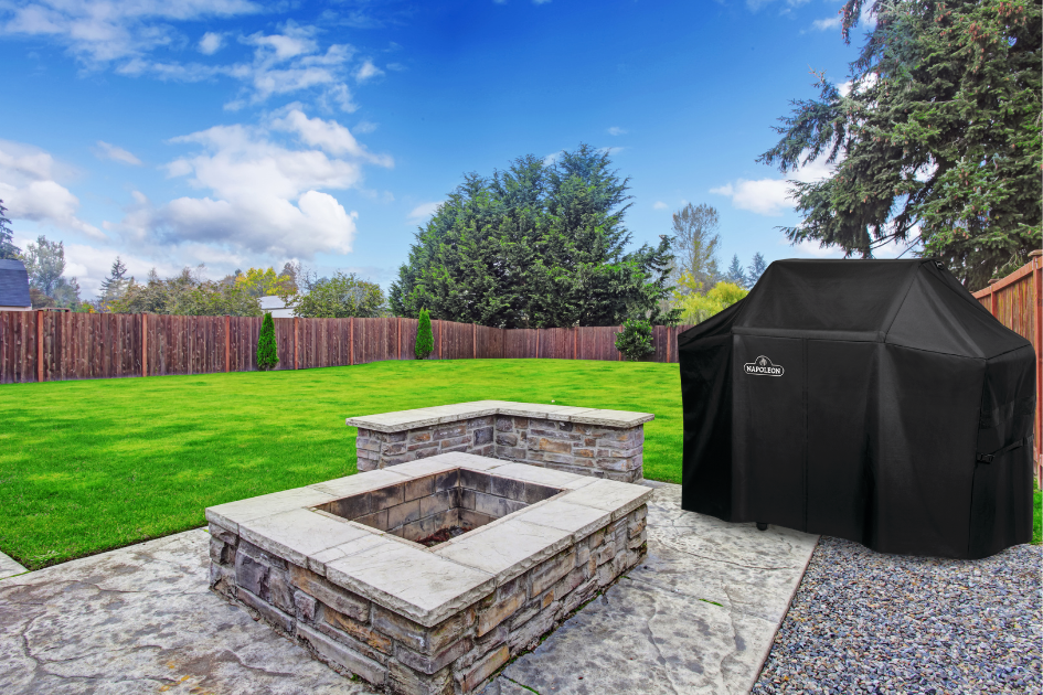 A covered grill on the edge of a patio